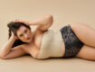 Plus size woman lounges